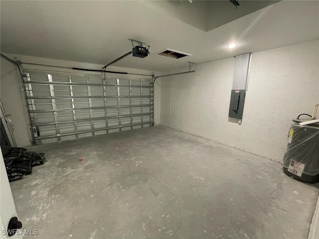 6024 Joplin Ave, Fort Myers, FL 33905 - garage featuring a garage door opener and electric panel