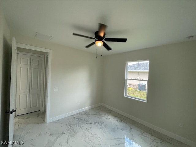 6024 Joplin Ave, Fort Myers, FL 33905 - empty room with baseboards, marble finish floor, and ceiling fan
