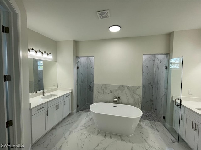 6024 Joplin Ave, Fort Myers, FL 33905 - bathroom with a marble finish shower, marble finish floor, a sink, visible vents, and two vanities