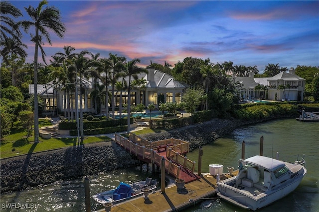 dock area featuring a water view