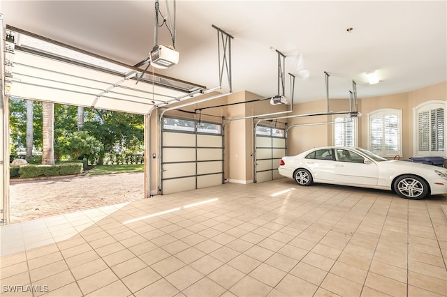 garage featuring a garage door opener