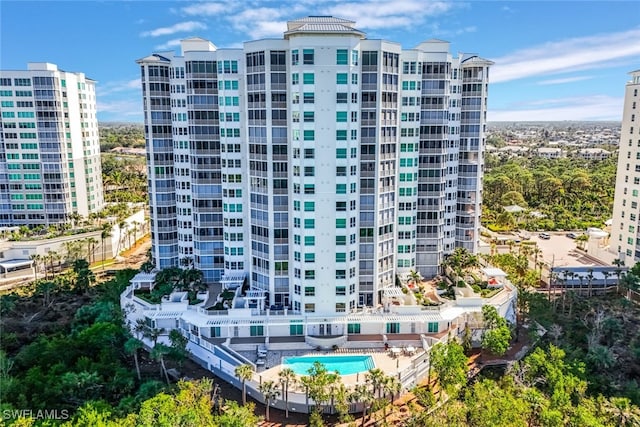 view of property with a pool