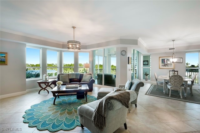 tiled living room featuring an inviting chandelier and ornamental molding