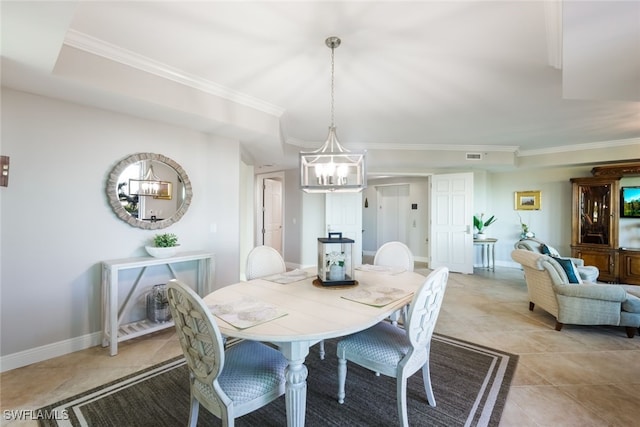 dining area featuring light tile patterned flooring, crown molding, and a notable chandelier