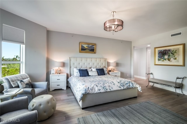 bedroom featuring hardwood / wood-style flooring