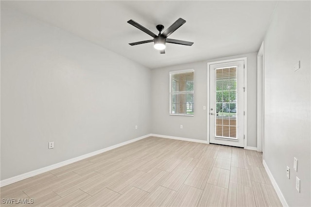 unfurnished room featuring ceiling fan