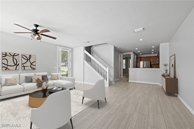 living room with ceiling fan