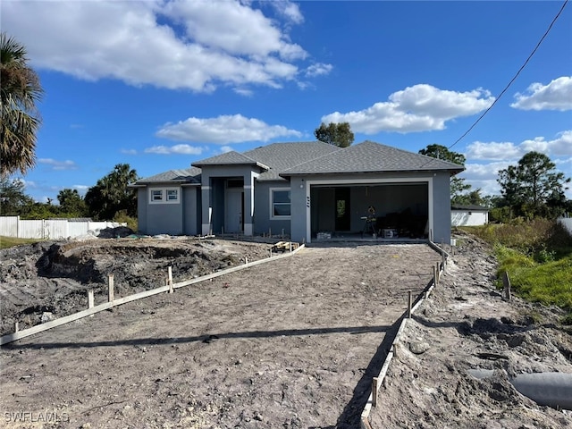 view of front of property with a garage