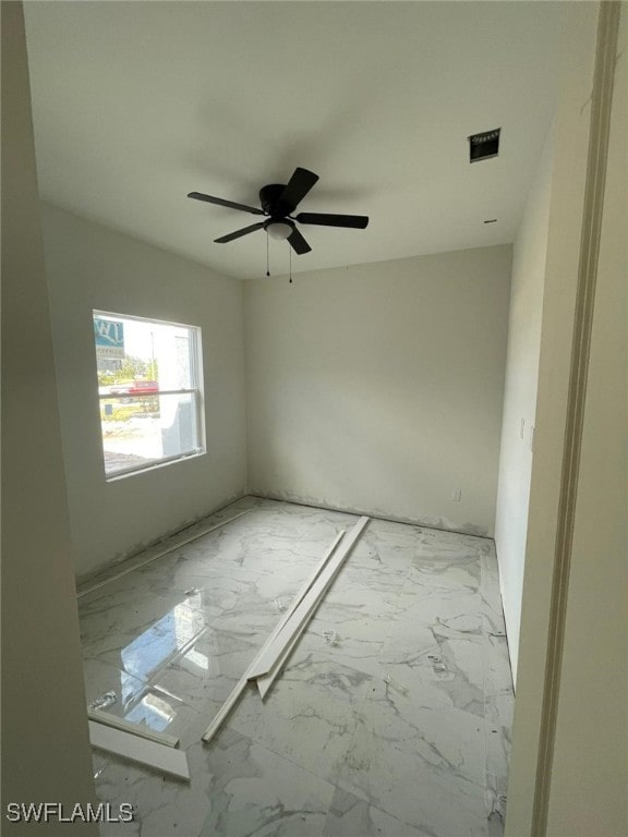 spare room featuring ceiling fan