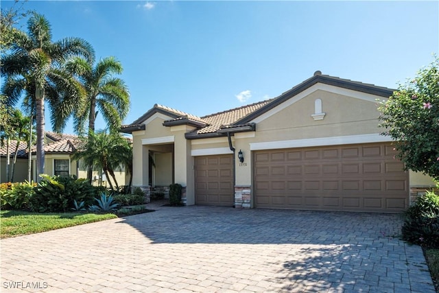 view of front of home with a garage