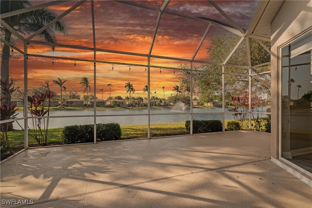 patio terrace at dusk with a water view