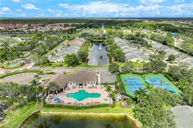 birds eye view of property featuring a water view