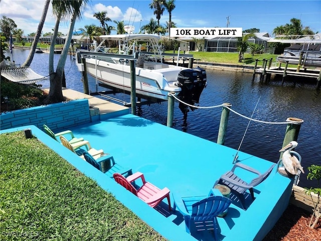 dock area featuring a water view