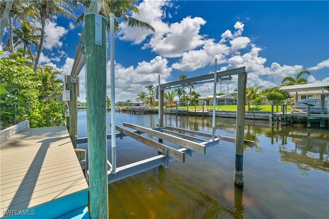 dock area featuring a water view