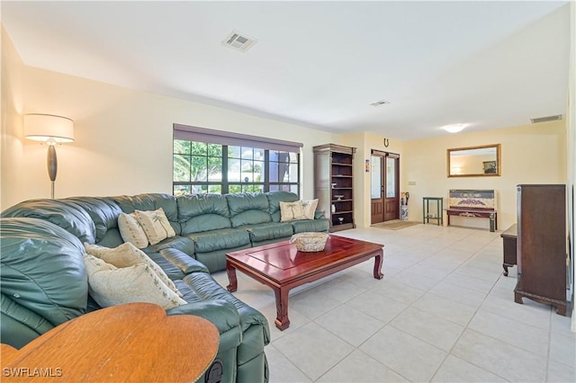 living room with light tile patterned floors