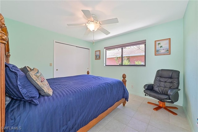 bedroom with ceiling fan, a closet, and light tile patterned flooring