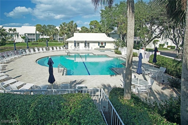 view of pool featuring a patio