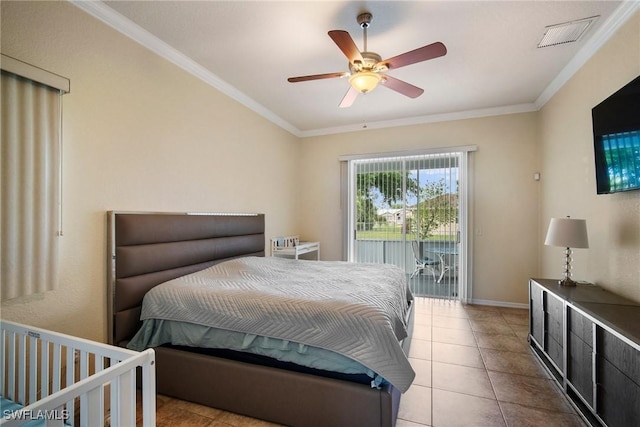 tiled bedroom with ceiling fan and crown molding