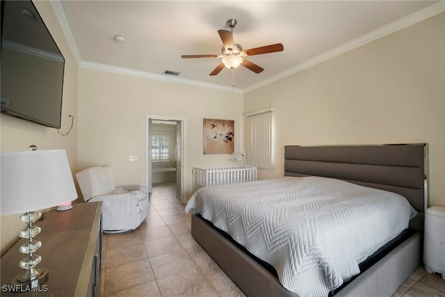 bedroom with ceiling fan, ornamental molding, light tile patterned floors, and connected bathroom