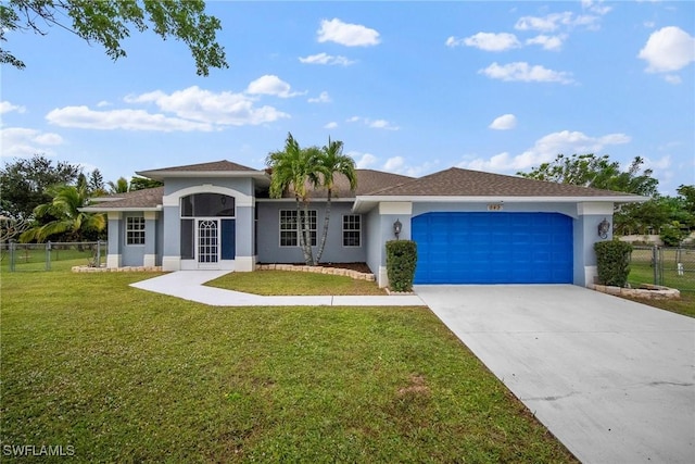 single story home with a garage and a front yard