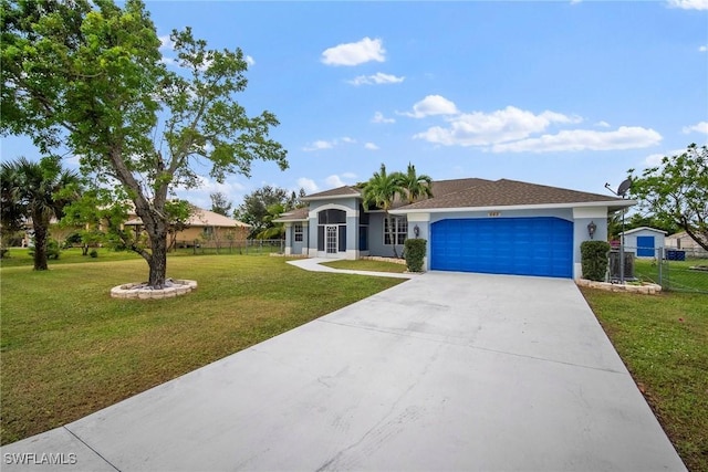 ranch-style house with a front lawn and a garage