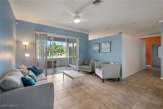 tiled living room featuring ceiling fan and ornamental molding