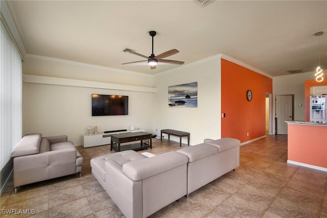 living room featuring ceiling fan and crown molding