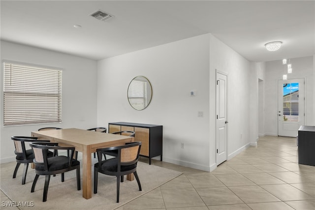 view of tiled dining space