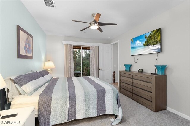 bedroom with ceiling fan, light colored carpet, visible vents, and baseboards