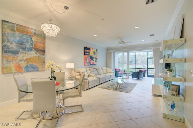 living room featuring ceiling fan with notable chandelier, ornamental molding, and light tile patterned floors