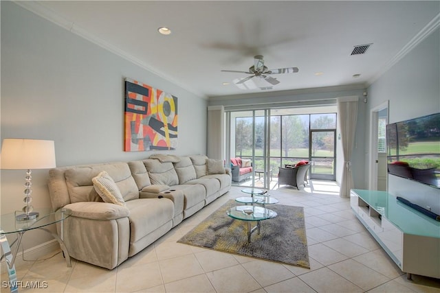 living room with visible vents, ornamental molding, light tile patterned flooring, ceiling fan, and baseboards