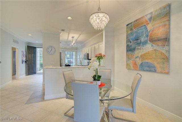 dining area with crown molding, light tile patterned floors, and an inviting chandelier