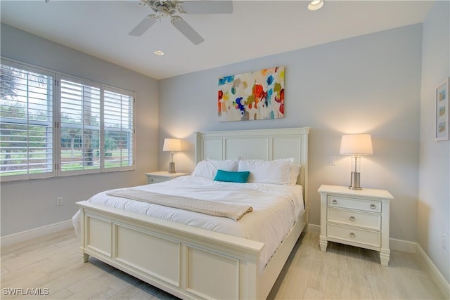 bedroom with light wood-style floors, ceiling fan, baseboards, and recessed lighting