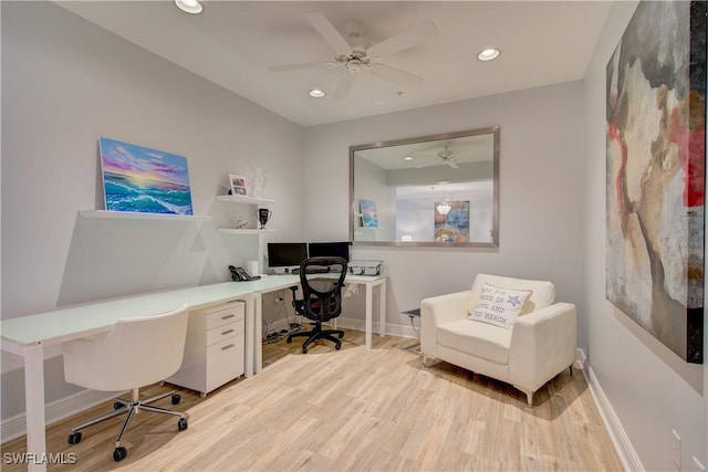 office space with a ceiling fan, recessed lighting, baseboards, and light wood finished floors