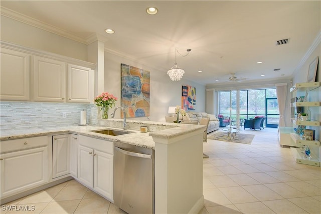 kitchen featuring a sink, crown molding, visible vents, and stainless steel dishwasher