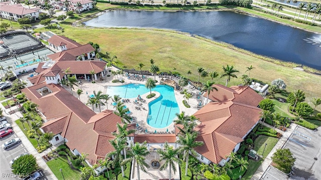 birds eye view of property featuring a water view