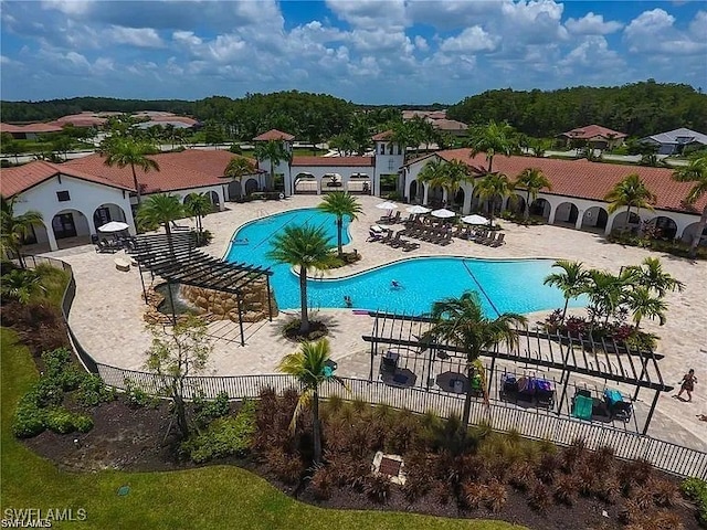 view of pool featuring a patio