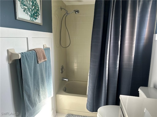 full bathroom featuring vanity, toilet, and shower / tub combo