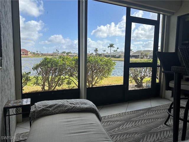 sunroom with a water view