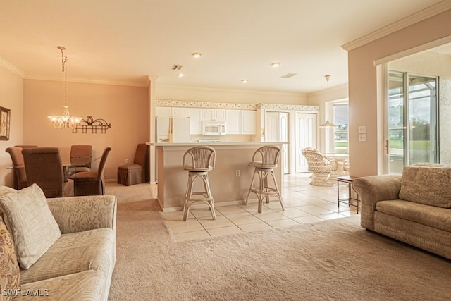 living room featuring a chandelier, crown molding, and light colored carpet