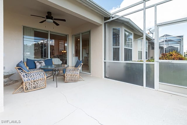 sunroom / solarium with ceiling fan