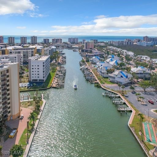 drone / aerial view with a water view