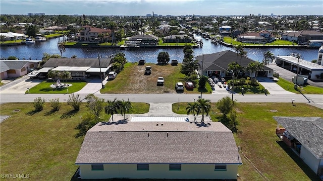 bird's eye view with a water view