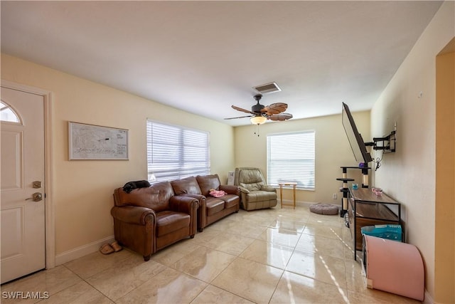 living room featuring ceiling fan