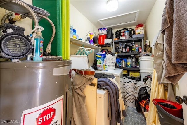 storage area featuring water heater