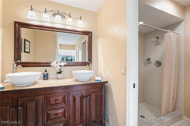 bathroom featuring a shower with curtain and vanity