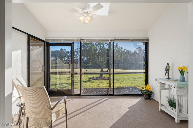 sunroom / solarium with ceiling fan