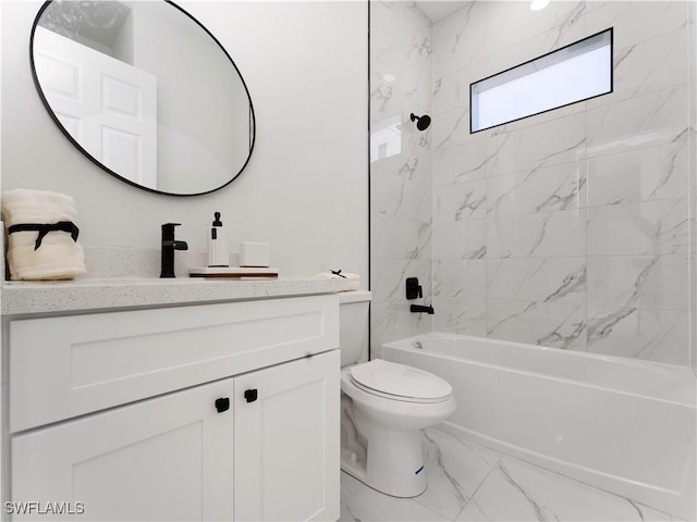 full bathroom with vanity, tiled shower / bath combo, and toilet