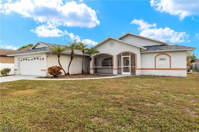 single story home featuring a garage and a front yard