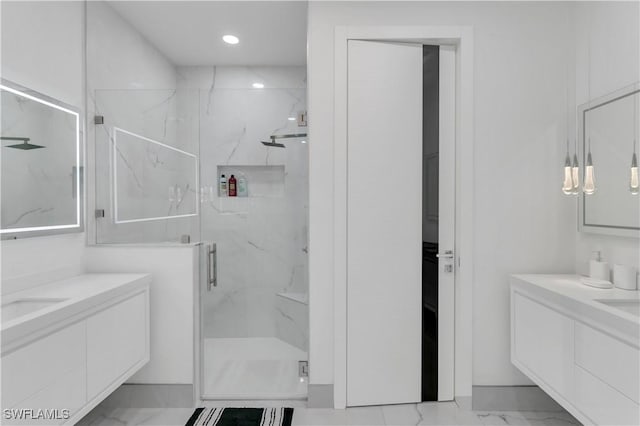 bathroom with vanity and walk in shower